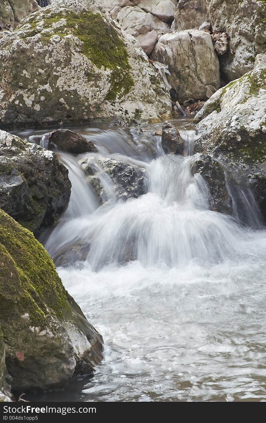 River between rocks. River between rocks