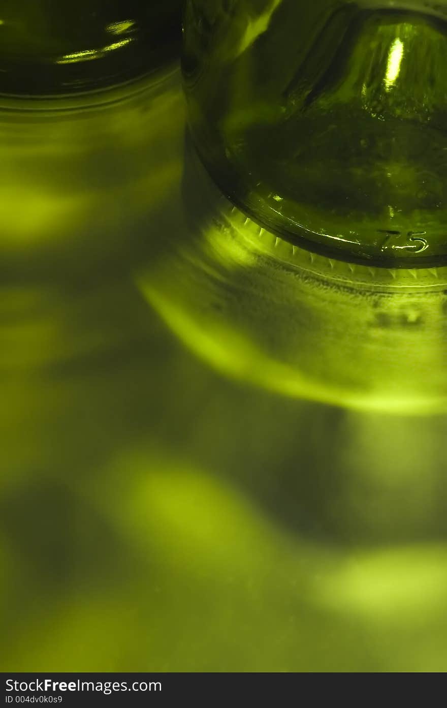 Reflection from two green bottles