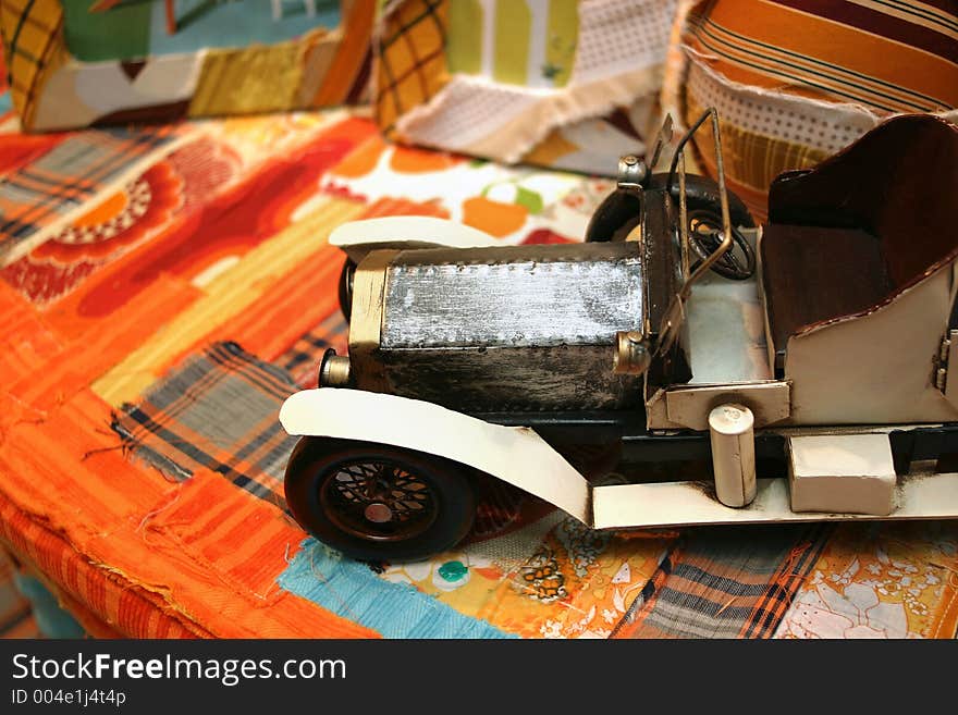 Toy car on the desk. Toy car on the desk.