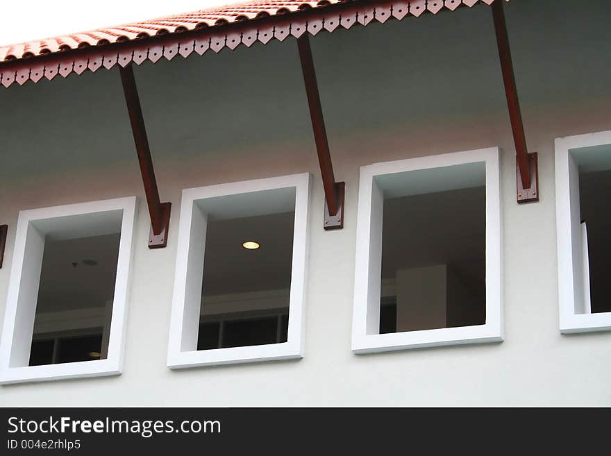 Windows next to a roof