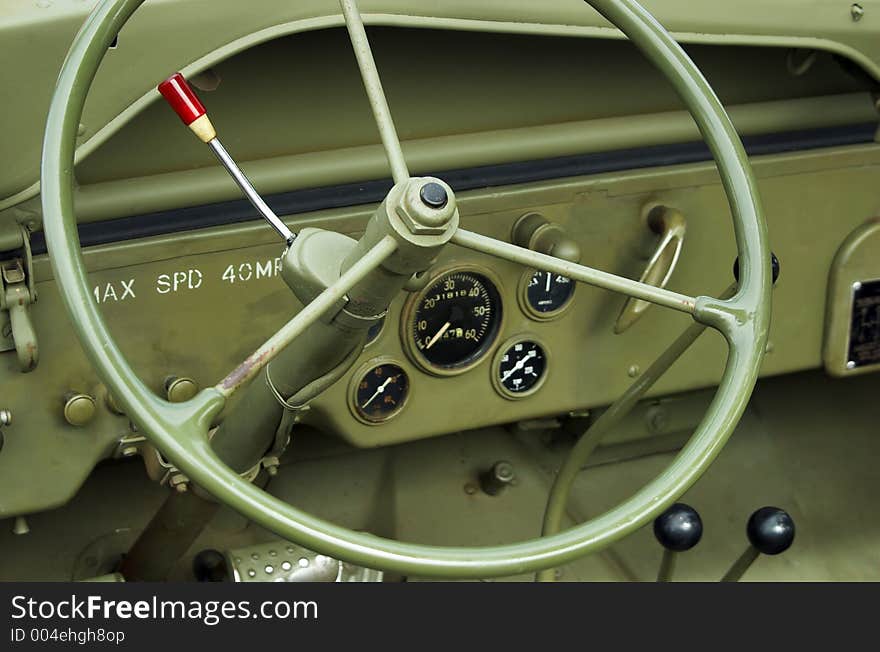 A closeup shot of the interior of an old army jeep. A closeup shot of the interior of an old army jeep.