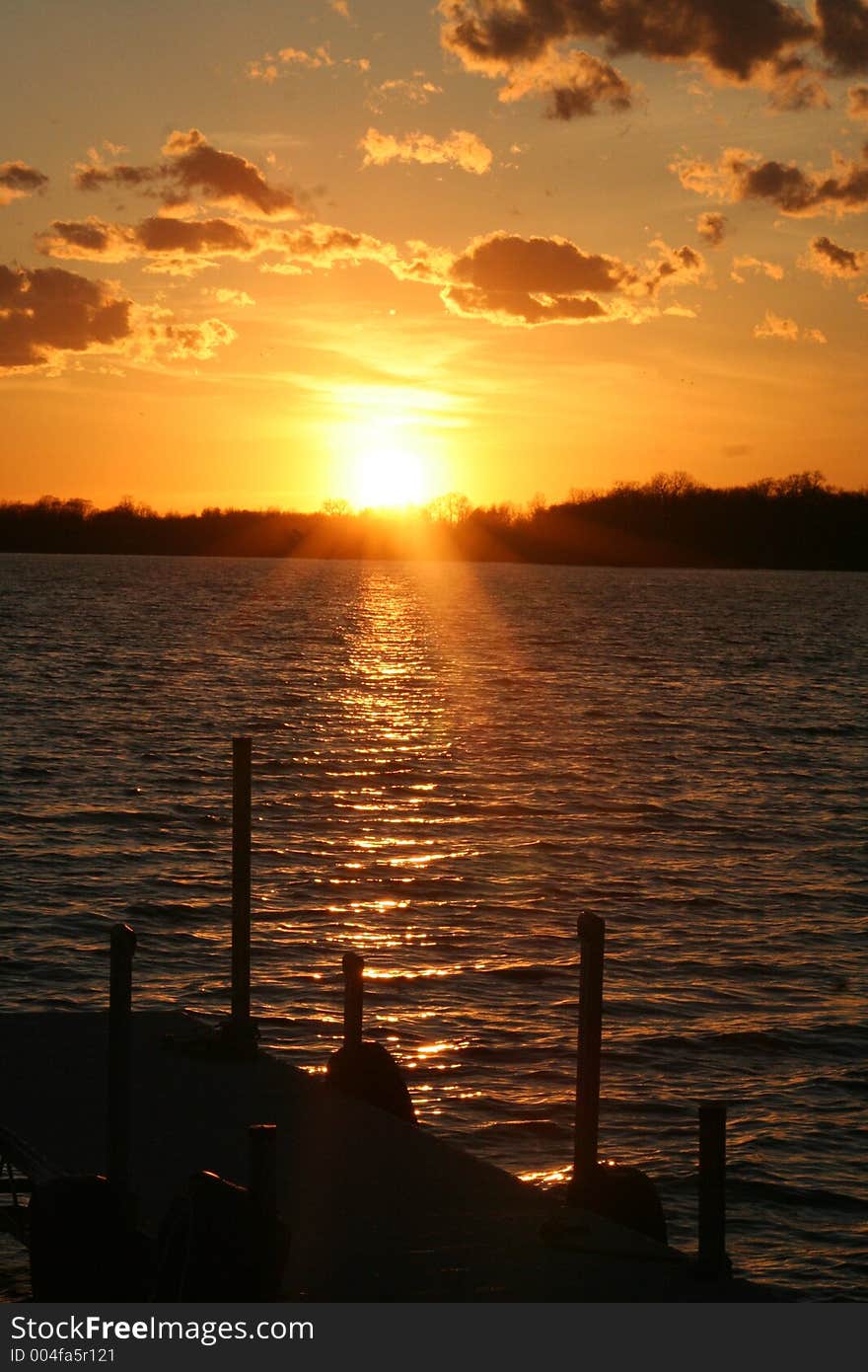 A view of a beautiful sunset from a dock. A view of a beautiful sunset from a dock.