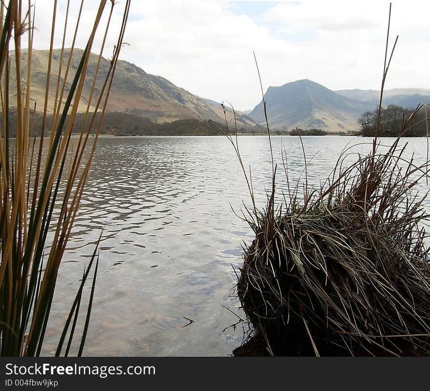 Fleetwith Pike from the shores of Crummock Water, Cumbria, UK. Fleetwith Pike from the shores of Crummock Water, Cumbria, UK