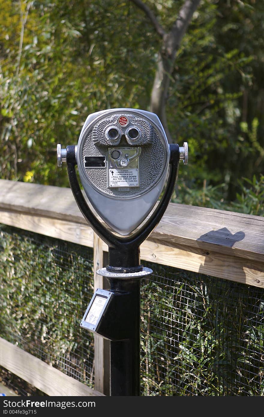 Coin operated binoculars. Coin operated binoculars