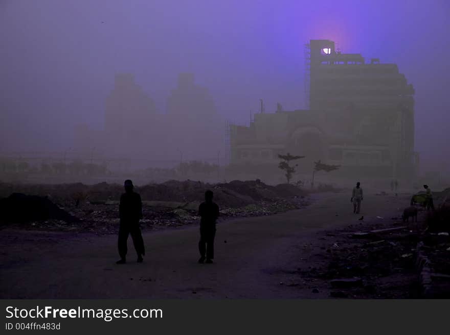 Full moon night moonrise behind new delhi building,. Full moon night moonrise behind new delhi building,