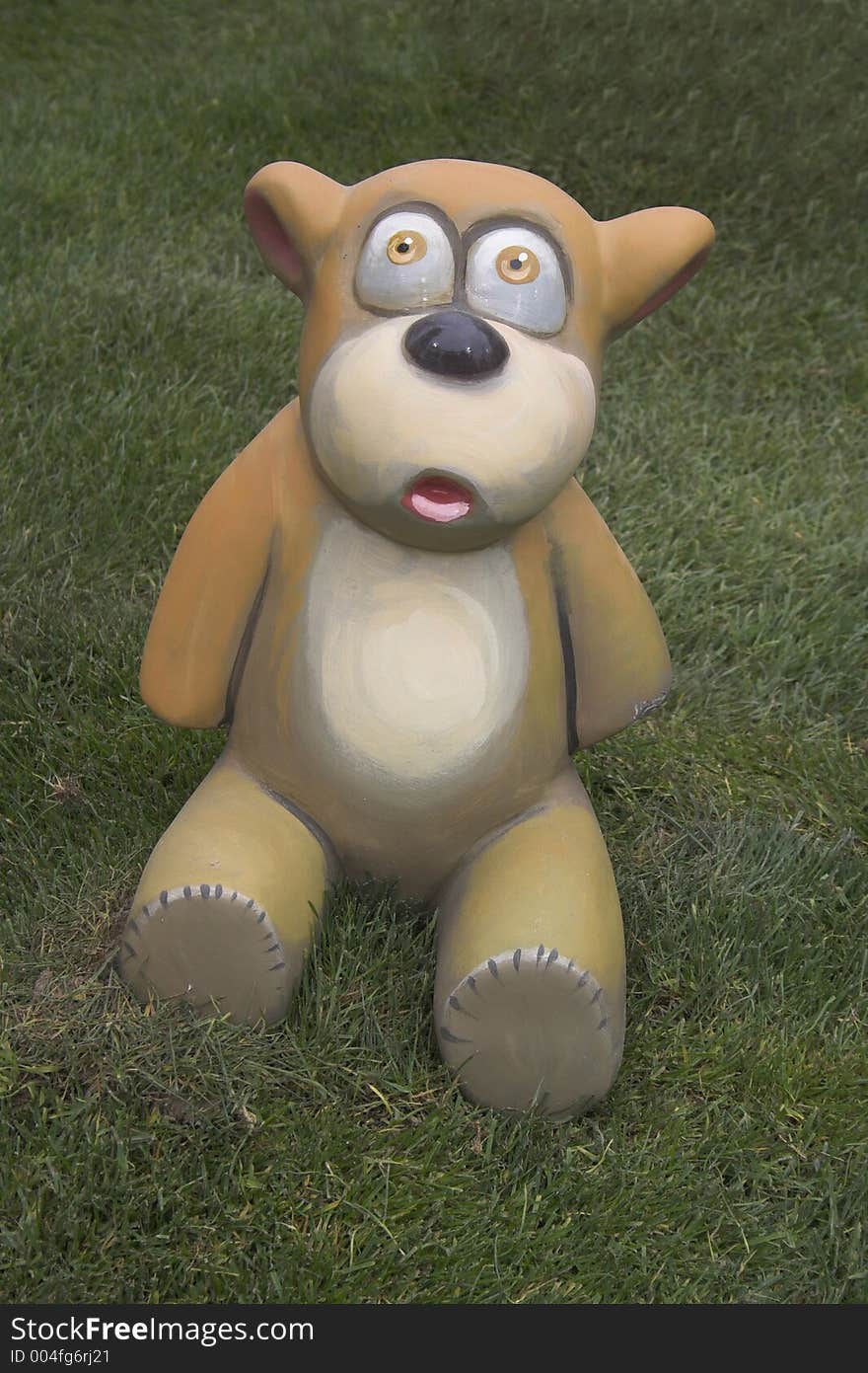 Cardboard bear in the grass. Cardboard bear in the grass