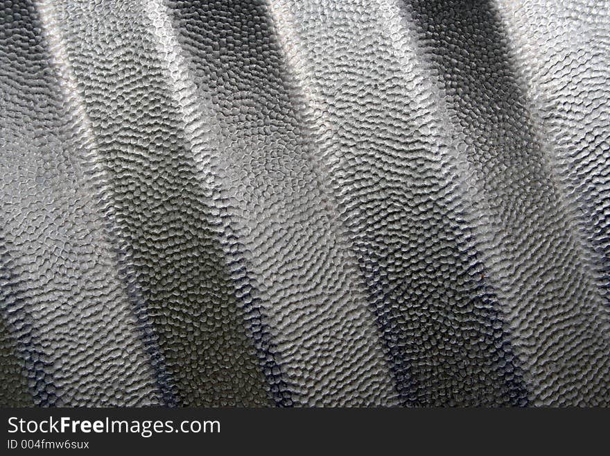 Dimpled texture on steel. Dimpled texture on steel.