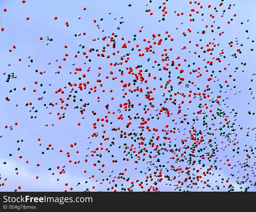 Many balloons flying in the sky