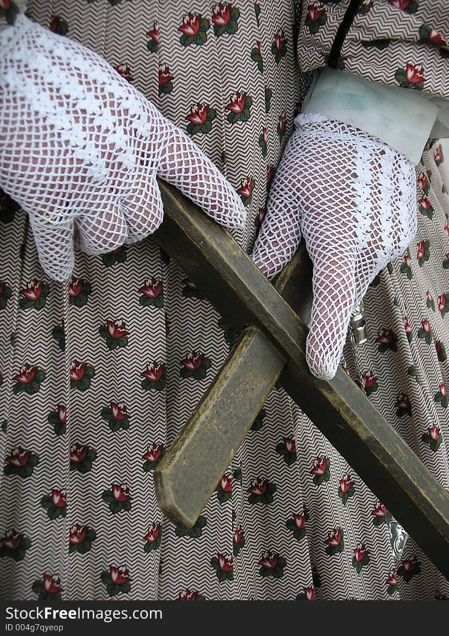 Hands in Lace holding cross. Hands in Lace holding cross