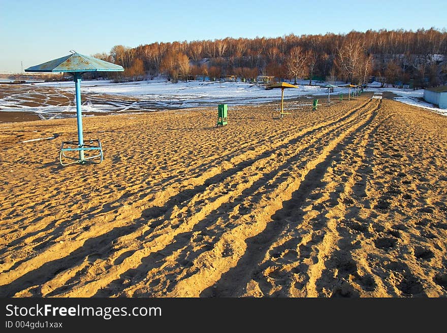 Spring beach and snow.