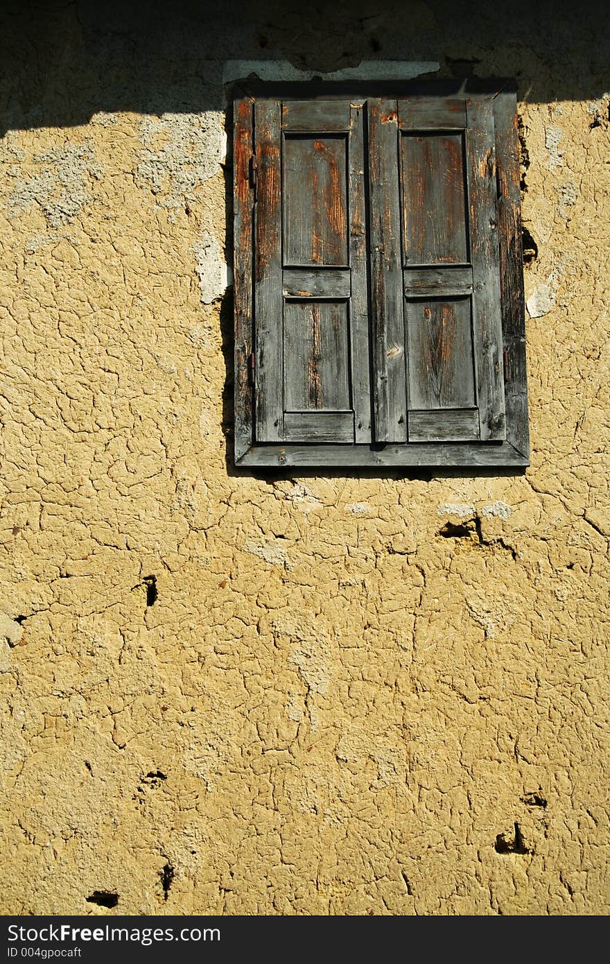 Wall with old wood window