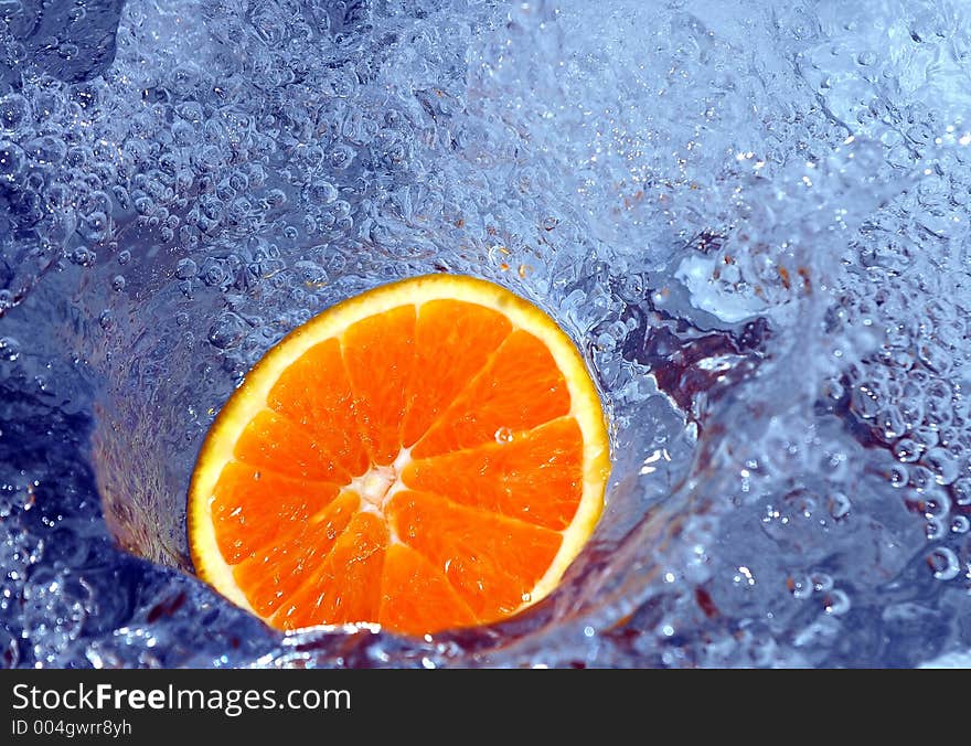 Orange splashing water. Orange splashing water