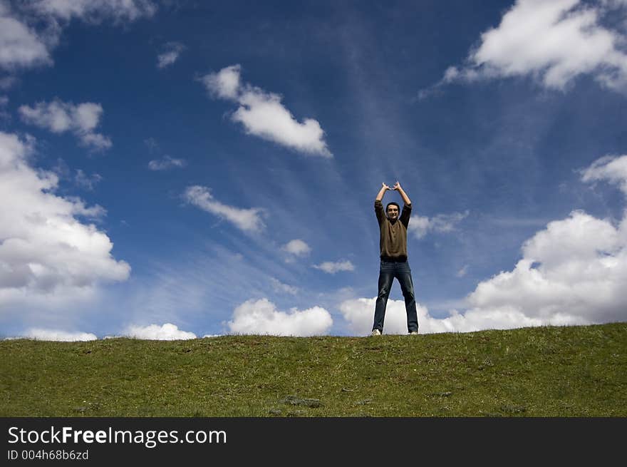 Joyful man with blue sky