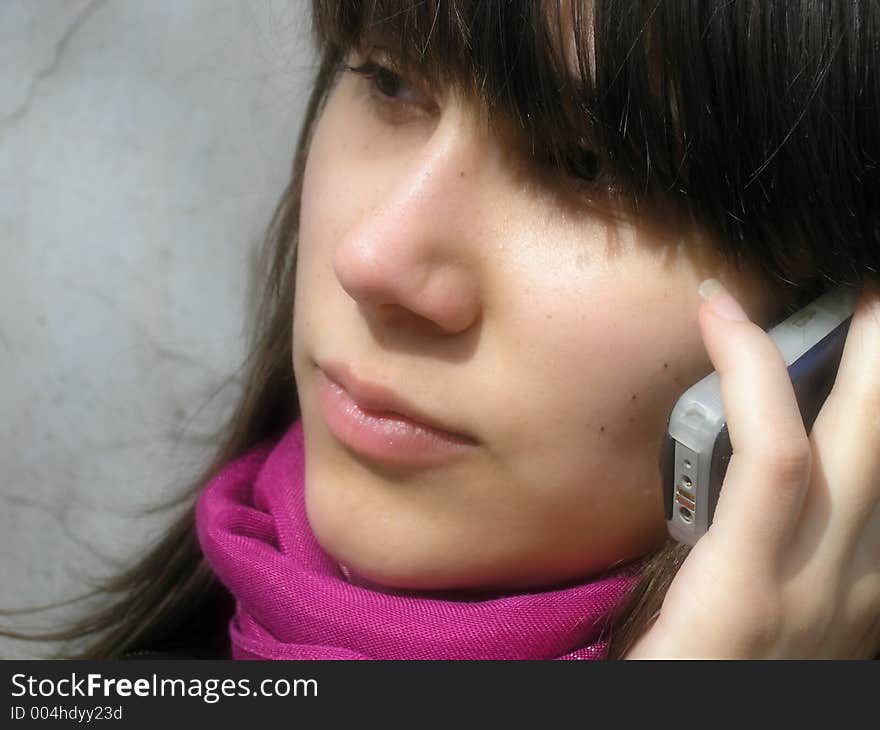 Girl with a phone,light-soft effect