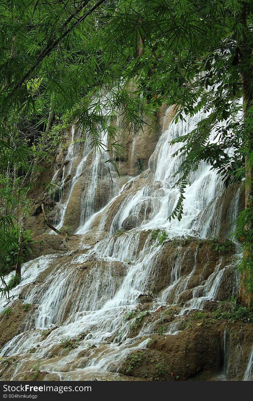 A waterfall in tropical forest of Thailand. A waterfall in tropical forest of Thailand.