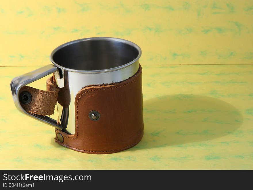 Steel mug in leather case