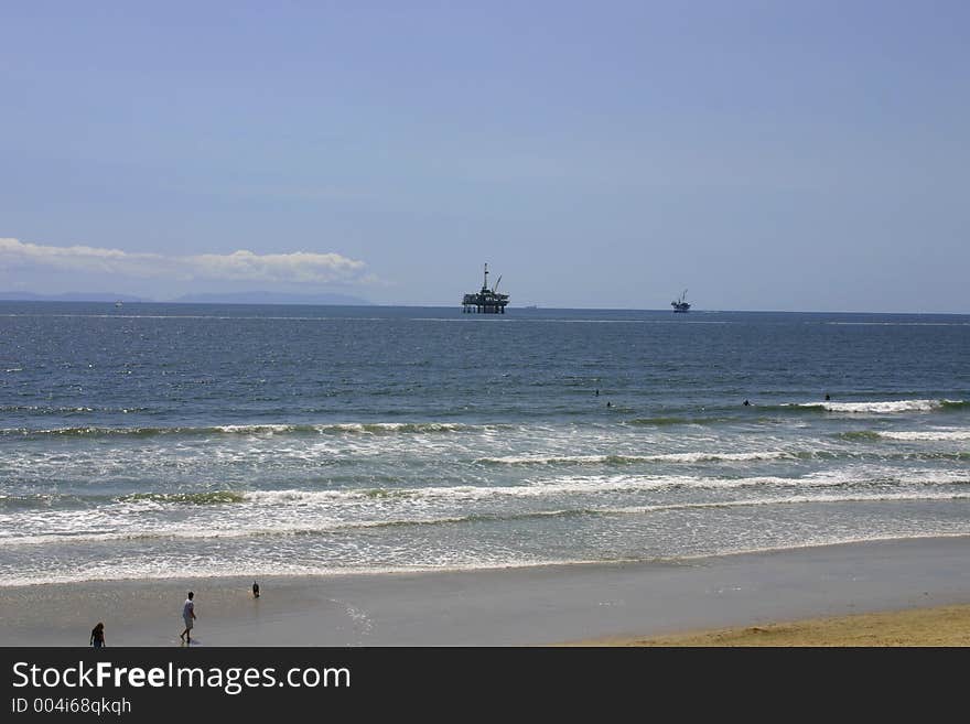 A view of 2 oil drilling platforms from the beach in So. California. A view of 2 oil drilling platforms from the beach in So. California