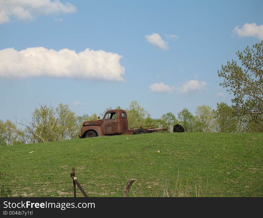 pickup truck rusty on hill