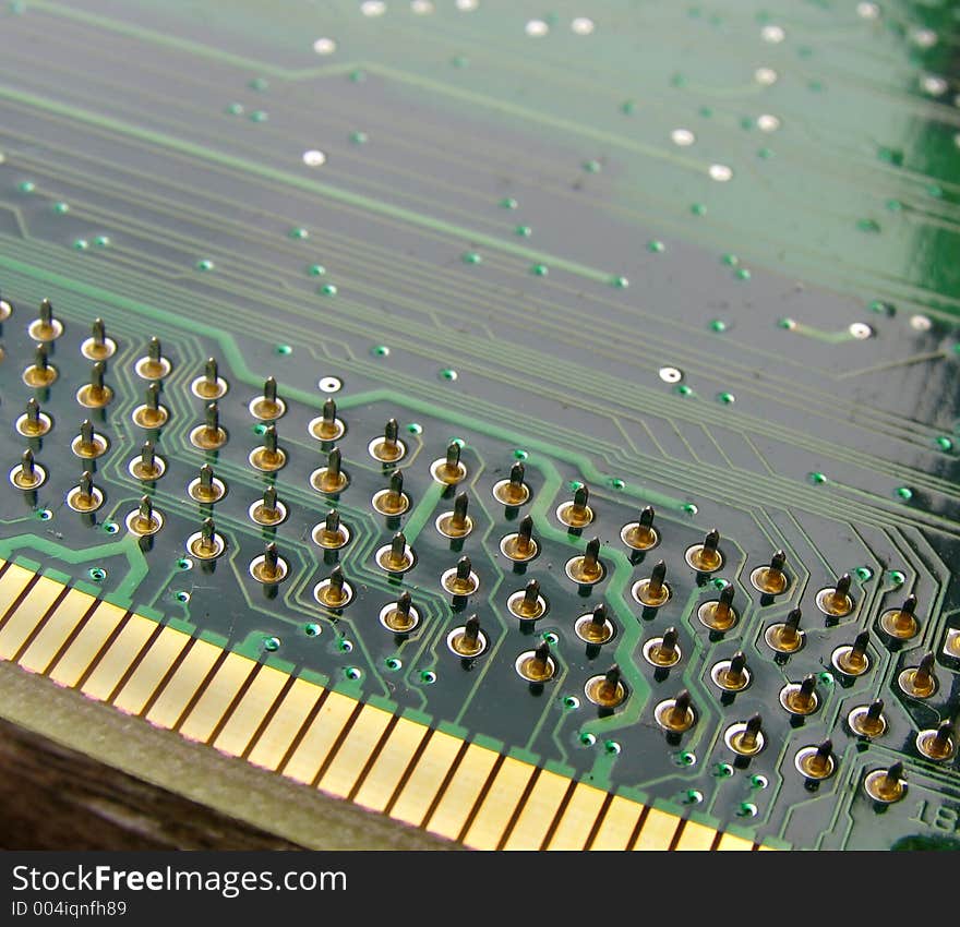 Printed circuit board with pins and connection interface in the foreground