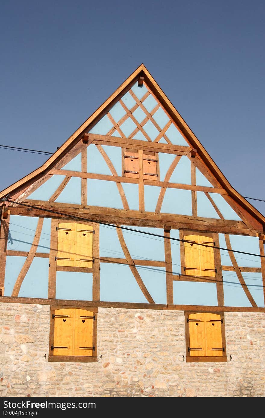 In the street of a alsacian villlage in the summer half timbered traditional house. In the street of a alsacian villlage in the summer half timbered traditional house