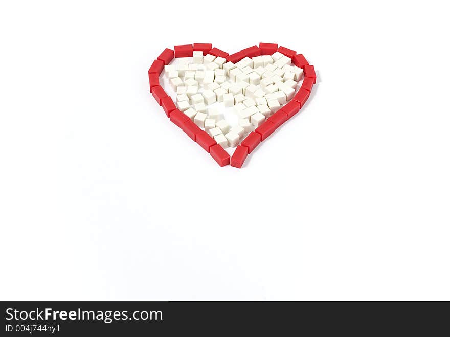 An heart shaped with small ruler pieces. An heart shaped with small ruler pieces