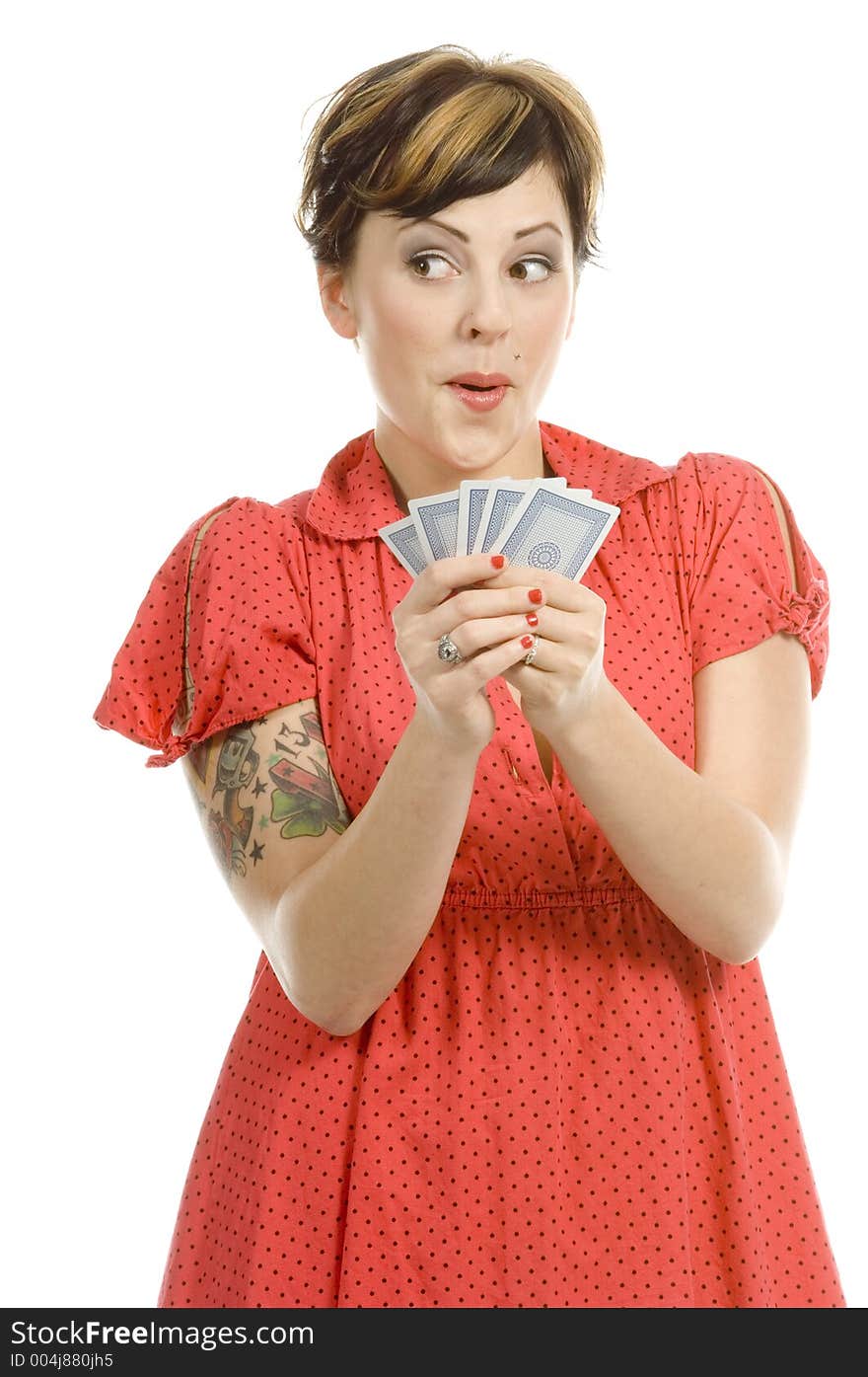 young actress with tattoos, a red girlish dress, poses different postures and expressions for an audition, with playing cards, over a white background. young actress with tattoos, a red girlish dress, poses different postures and expressions for an audition, with playing cards, over a white background