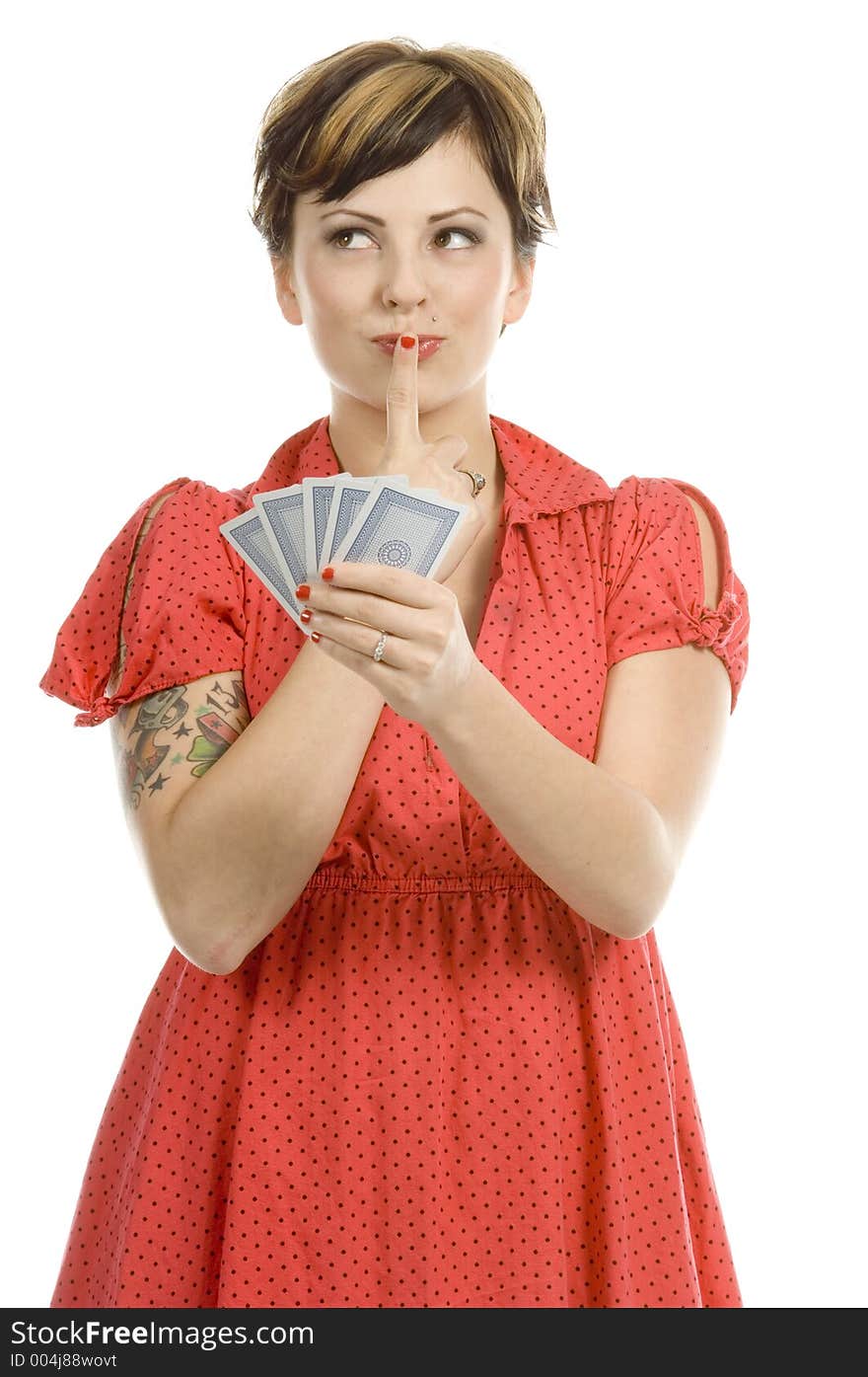 young actress with tattoos, a red girlish dress, poses different postures and expressions for an audition, with playing cards, over a white background. young actress with tattoos, a red girlish dress, poses different postures and expressions for an audition, with playing cards, over a white background