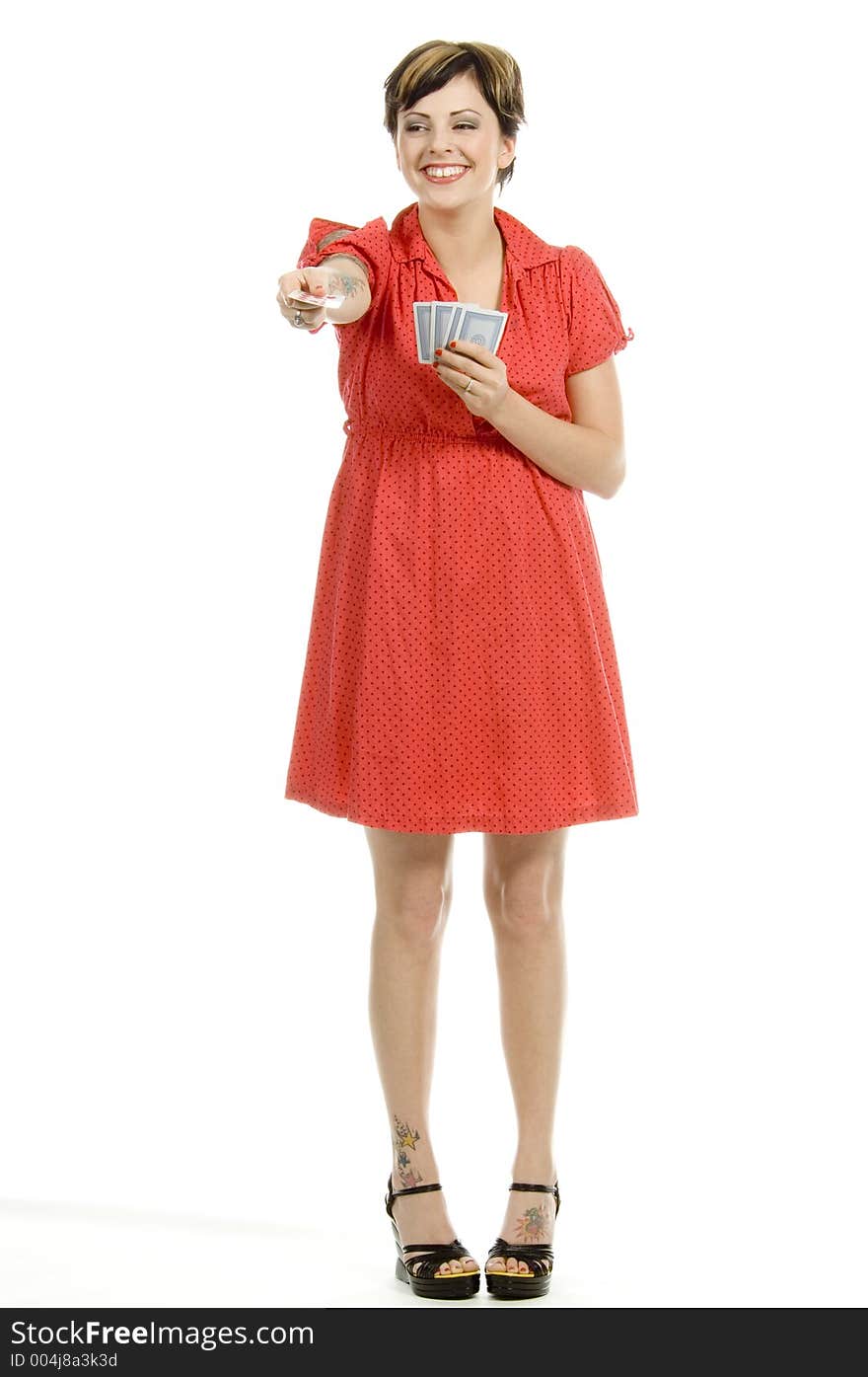 young actress with tattoos, a red girlish dress, poses different postures and expressions for an audition, with playing cards, over a white background. young actress with tattoos, a red girlish dress, poses different postures and expressions for an audition, with playing cards, over a white background