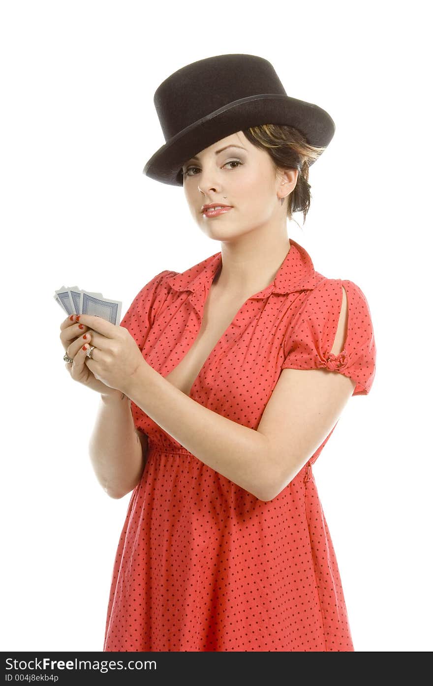 young actress with tattoos, a red girlish dress, poses different postures and expressions for an audition, with playing cards and a big black hat, over a white background. young actress with tattoos, a red girlish dress, poses different postures and expressions for an audition, with playing cards and a big black hat, over a white background