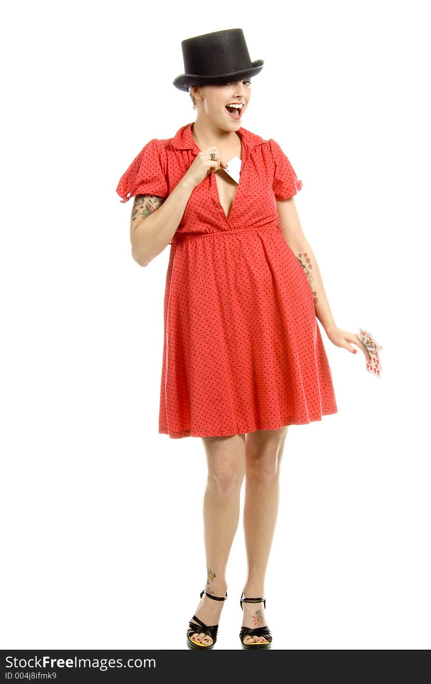 young actress with tattoos, a red girlish dress, poses different postures and expressions for an audition, with playing cards and a big black hat, over a white background. young actress with tattoos, a red girlish dress, poses different postures and expressions for an audition, with playing cards and a big black hat, over a white background