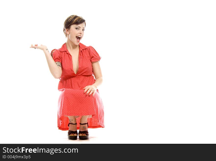 young actress with tattoos, a red girlish dress, poses different postures and expressions for an audition, playing with dices, down on the white floor. young actress with tattoos, a red girlish dress, poses different postures and expressions for an audition, playing with dices, down on the white floor