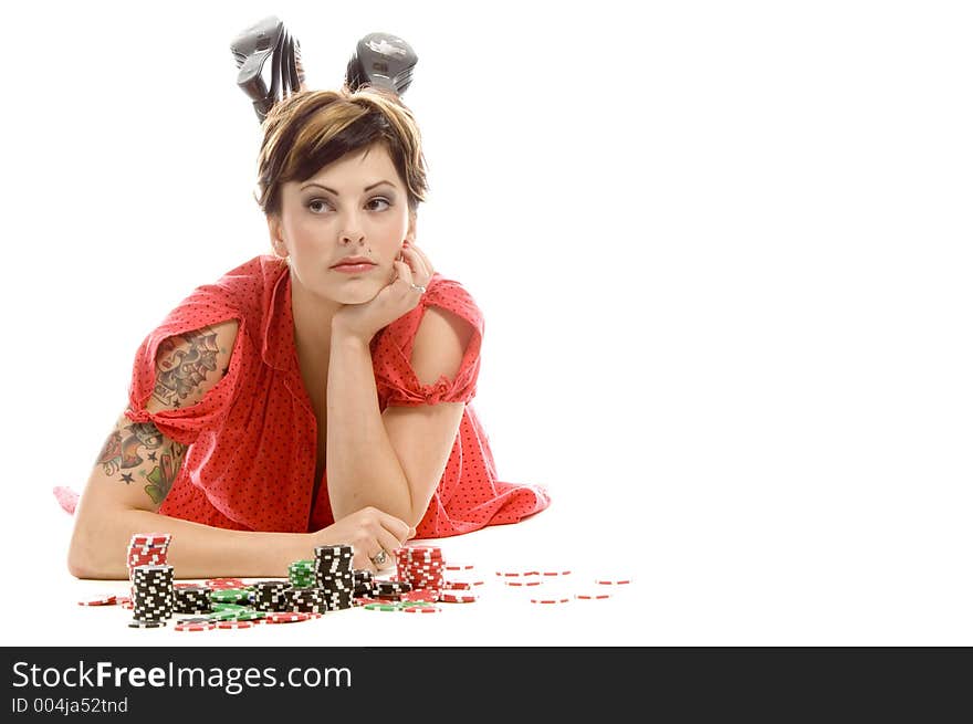 young actress with tattoos, a red girlish dress, poses different postures and expressions for an audition, with tokens in front of her, down on the white floor. young actress with tattoos, a red girlish dress, poses different postures and expressions for an audition, with tokens in front of her, down on the white floor