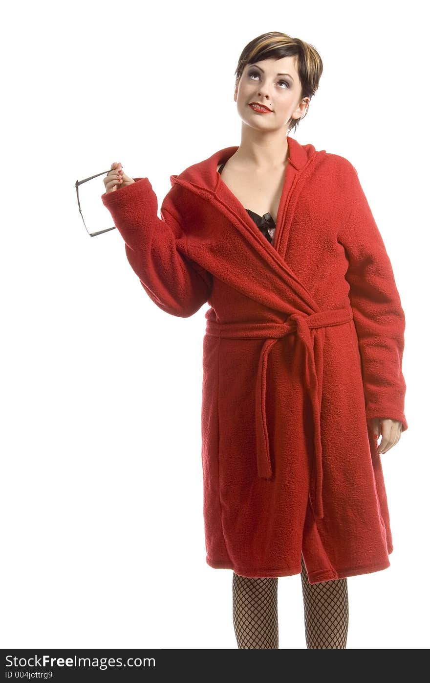 Young woman in red bathrobe holding her glasses. Young woman in red bathrobe holding her glasses