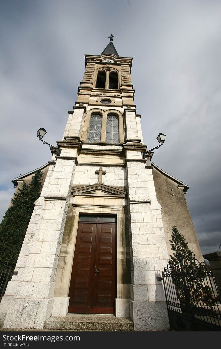 In the street of a alsacian villlage in the summer, achurch