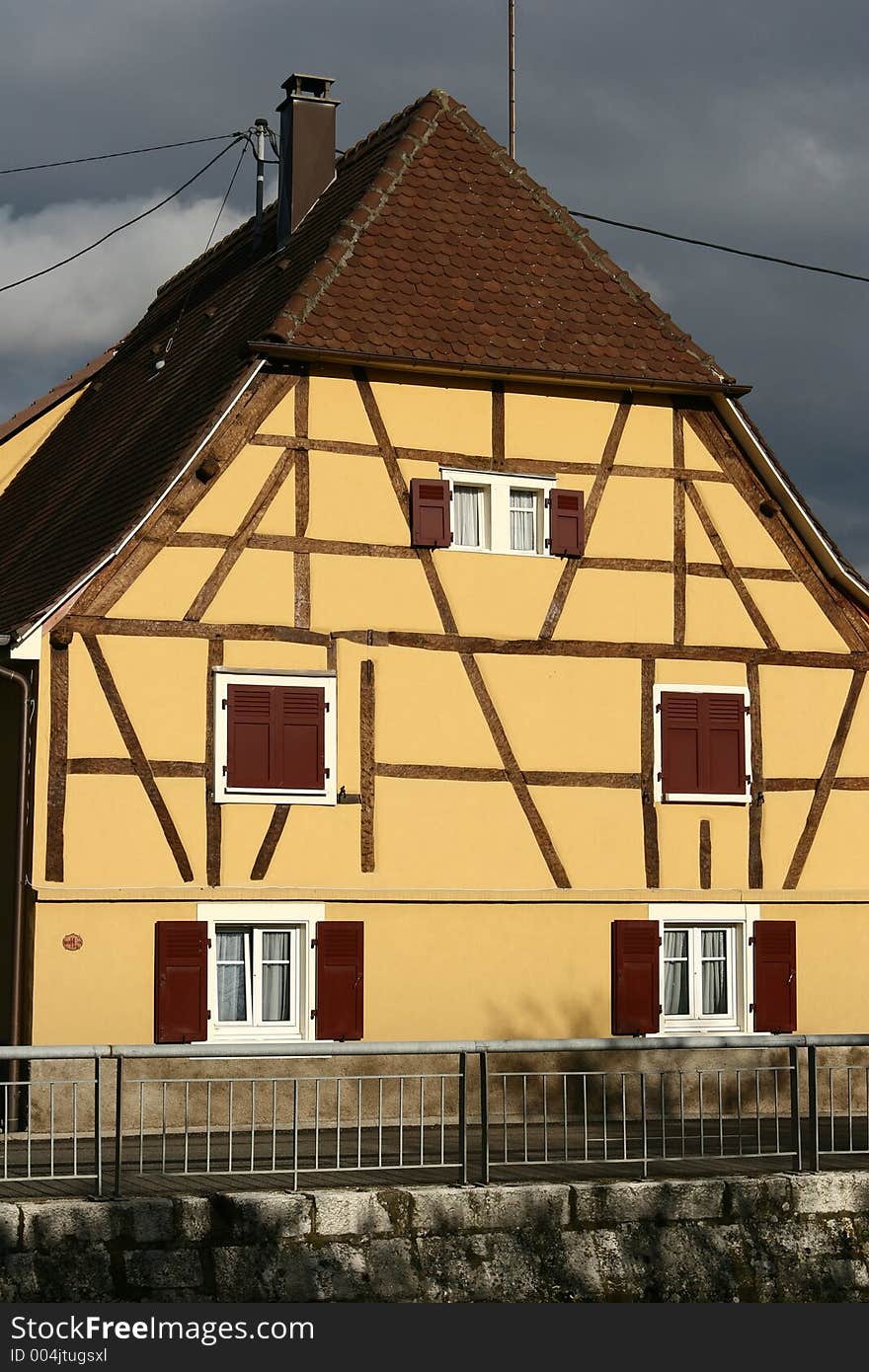 In the street of a alsacian villlage in the summer, half timbered traditional house. In the street of a alsacian villlage in the summer, half timbered traditional house