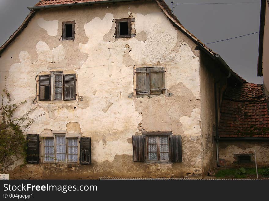 In the street of a alsacian villlage in the summer, very old house. In the street of a alsacian villlage in the summer, very old house