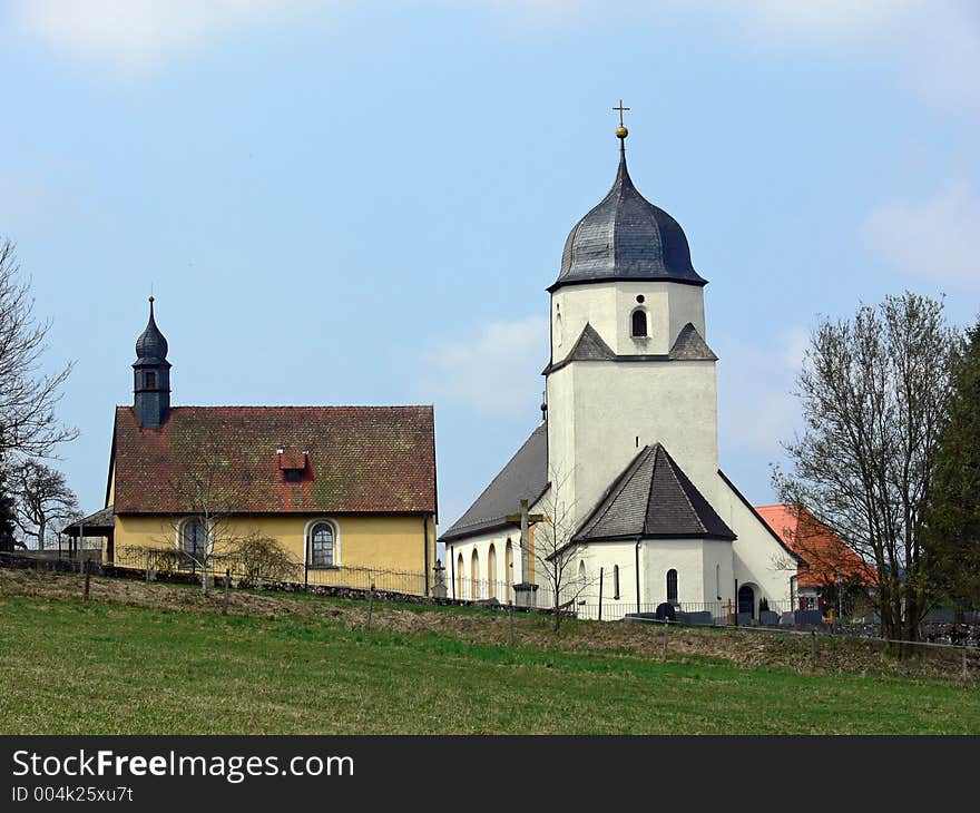 Church and chapel in a German village at springtime. Church and chapel in a German village at springtime