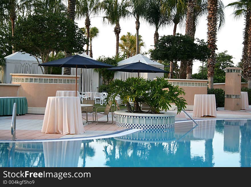 Pool Scenic with tables set for an event or formal occassion. Pool Scenic with tables set for an event or formal occassion