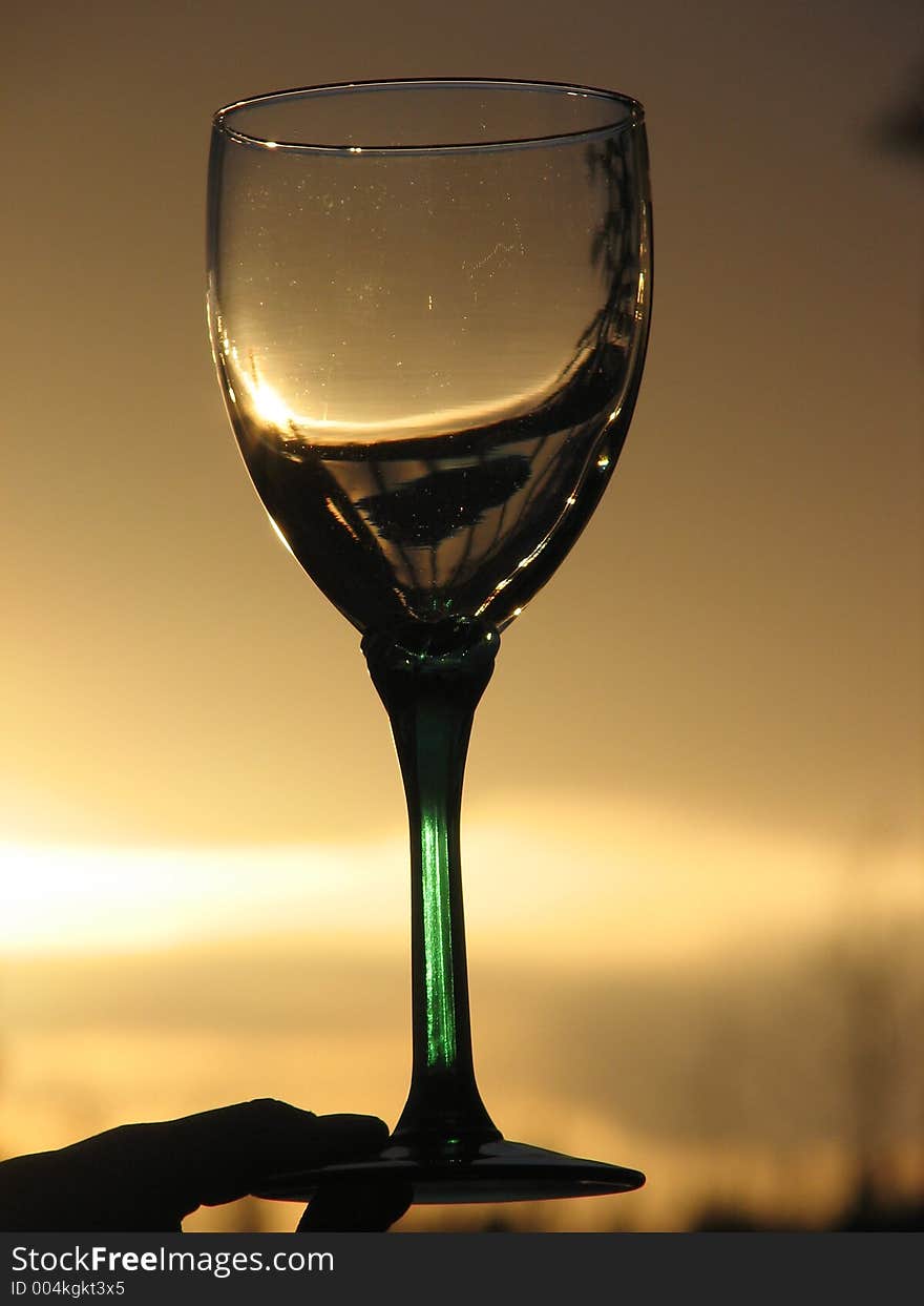 Wine glass at sunset