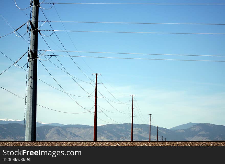 Powerlines with mountains in the background. Powerlines with mountains in the background