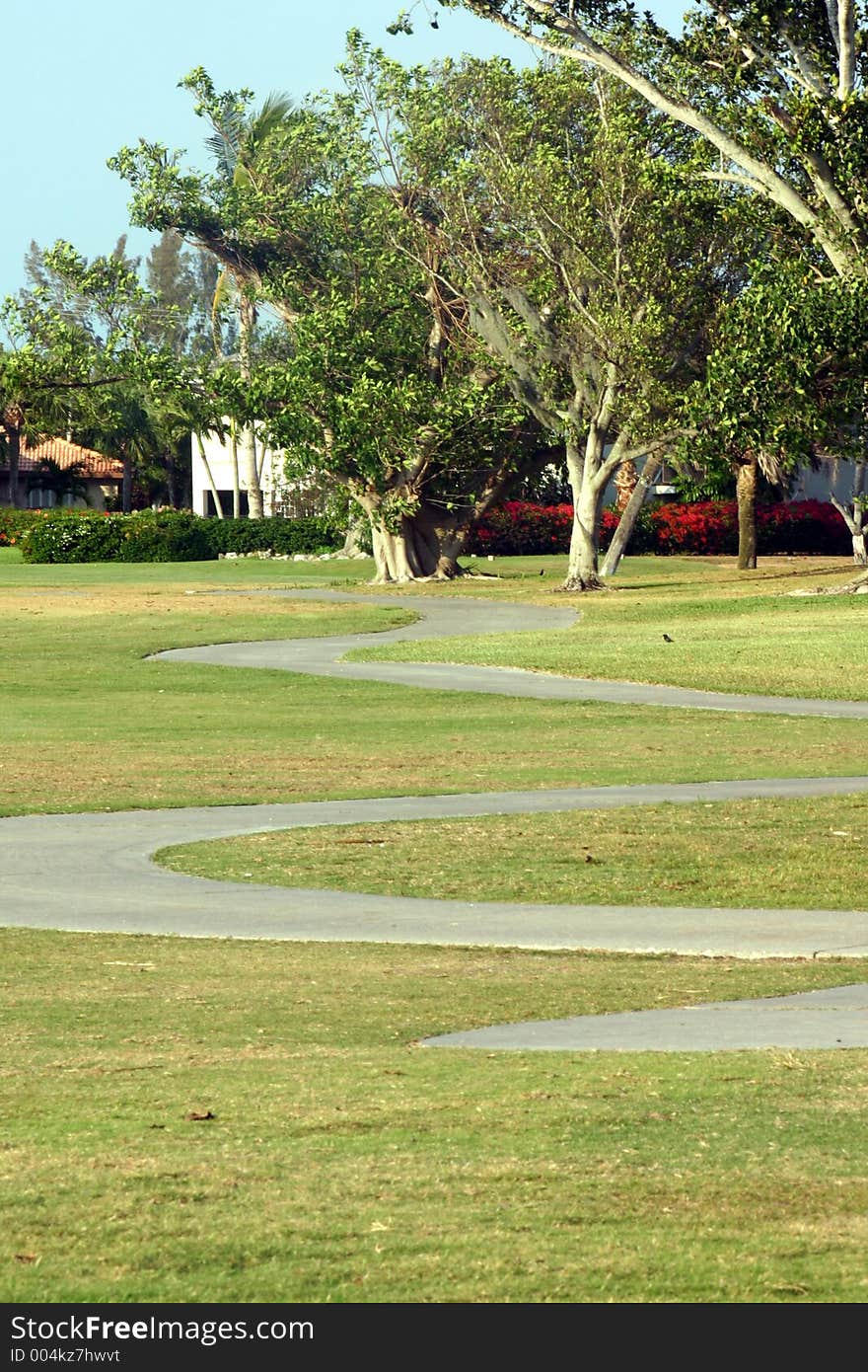 The windy path for a golf cart at a country club. The windy path for a golf cart at a country club