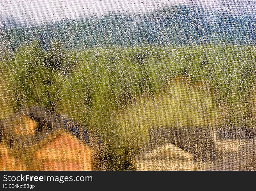 Looking at the window on a rainy day