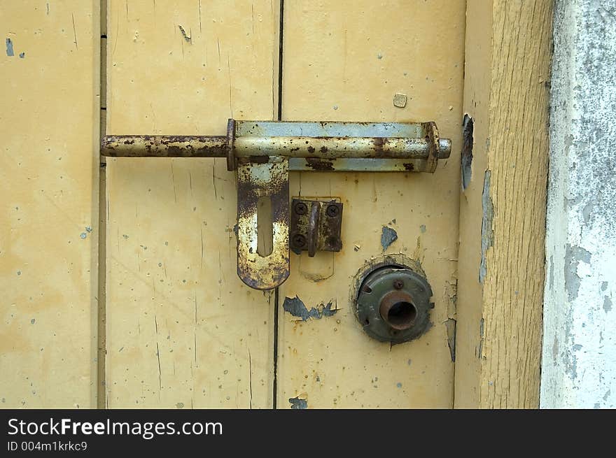 Old Door With Padlock