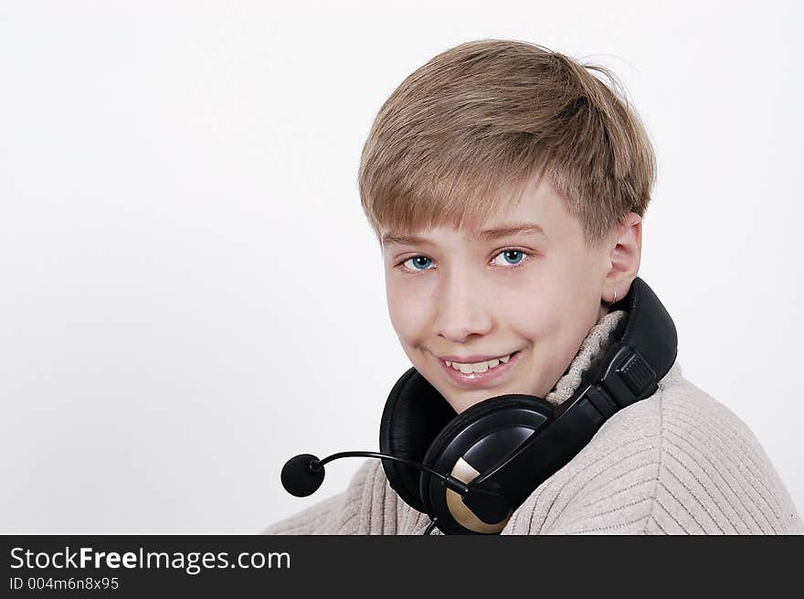 Cheerful boy in headphones. Cheerful boy in headphones