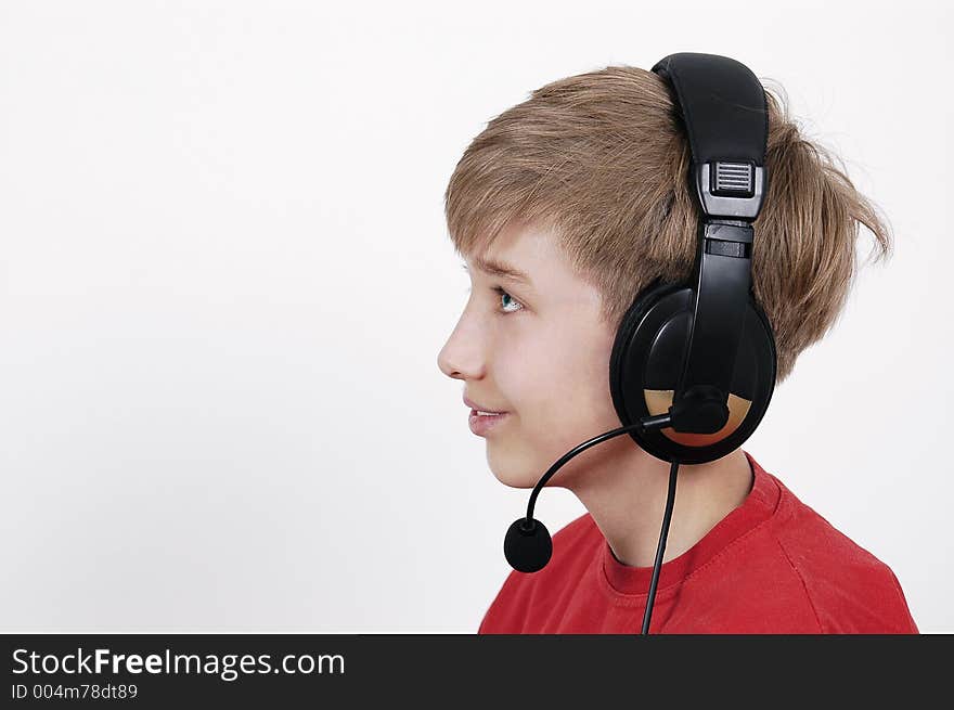 Cheerful boy in headphones. Cheerful boy in headphones