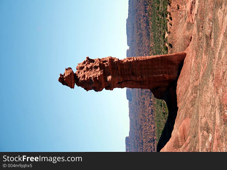 A natural stone formation in the form of a monk found in the desert of Argentina. A natural stone formation in the form of a monk found in the desert of Argentina