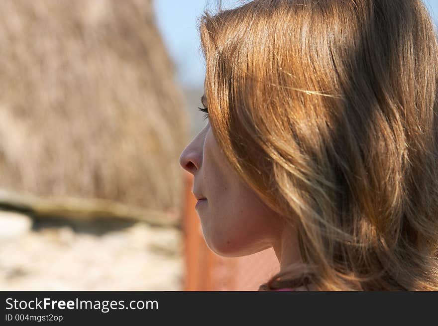 Girl head shoot close-up in spring sun. Girl head shoot close-up in spring sun