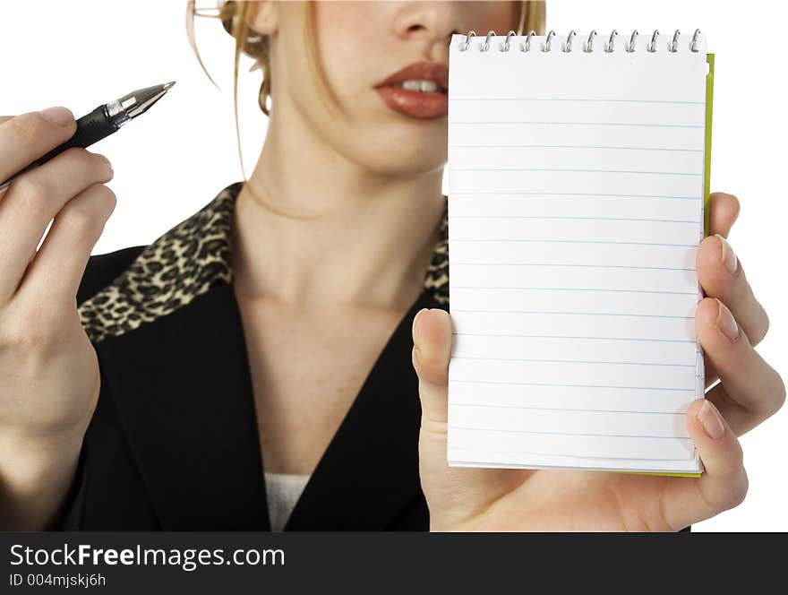 Small memo pad held toward camera by beautiful young Hispanic business woman. Small memo pad held toward camera by beautiful young Hispanic business woman.