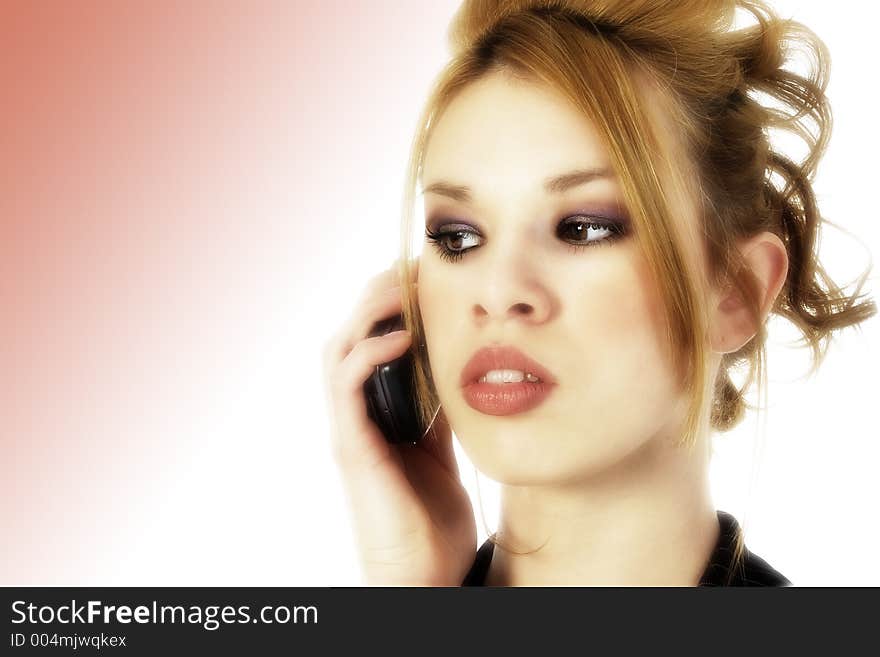 Head shot of beautiful Hispanic business woman on cellphone. Focus on eyes. Head shot of beautiful Hispanic business woman on cellphone. Focus on eyes.