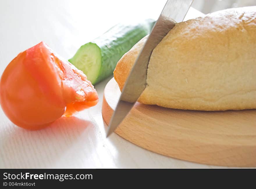 Preparing breakfast and slicing bread